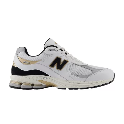 New Balance 2002R White Black Gold Metallic alacsony szárú sneaker – termékfotó, oldalnézet