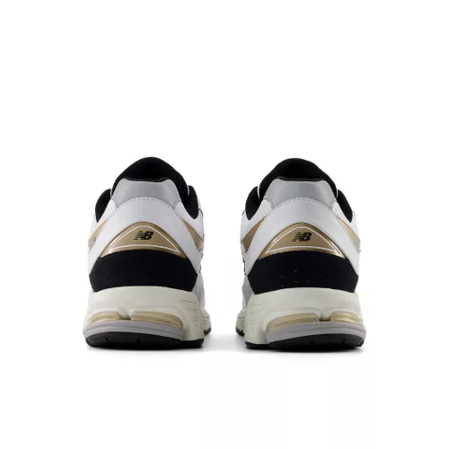 New Balance 2002R White Black Gold Metallic alacsony szárú sneaker – termékfotó, oldalnézet